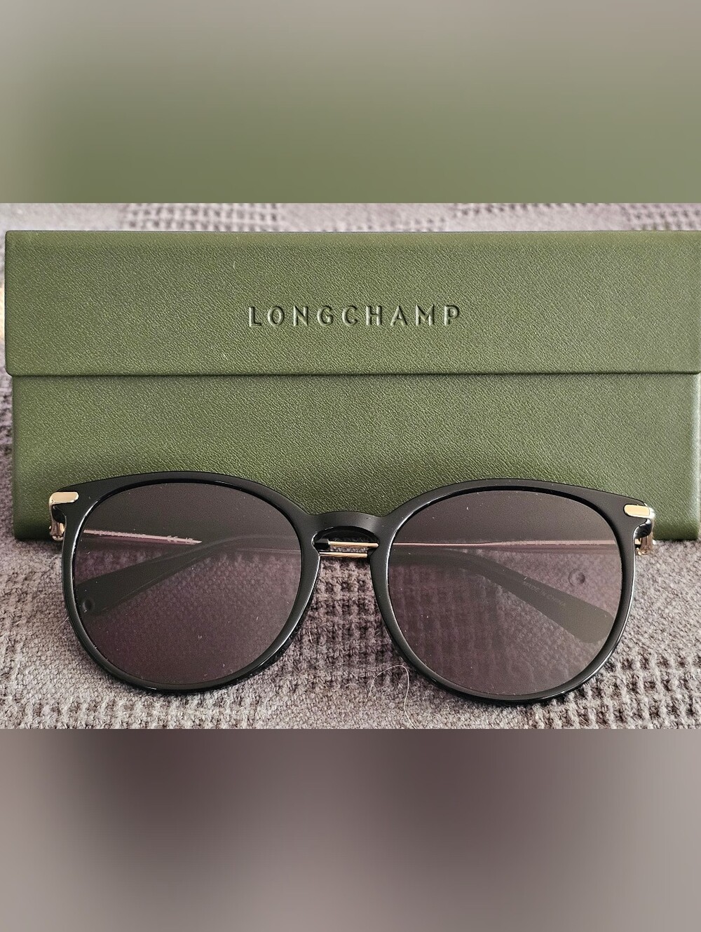 Longchamp Women's Black Round Sunglasses - Elegant Black Frames